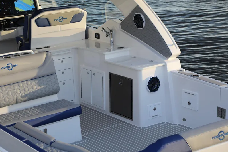 Slide: The Image of Interior of 2025 Fountain 39 DX boat with seating and storage compartments. - 13