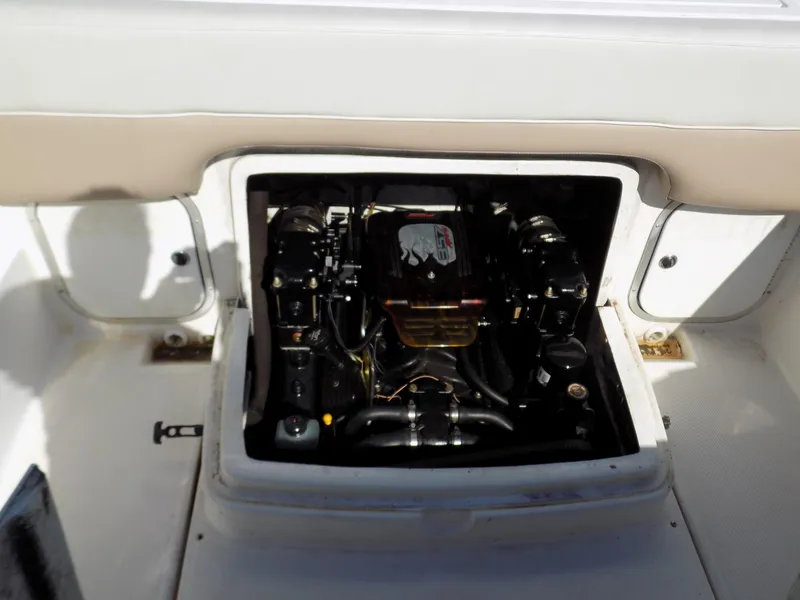 Slide: The Image of Engine compartment of a 2001 Bayliner 2252 Ciera Classic boat, showcasing the motor. - 10