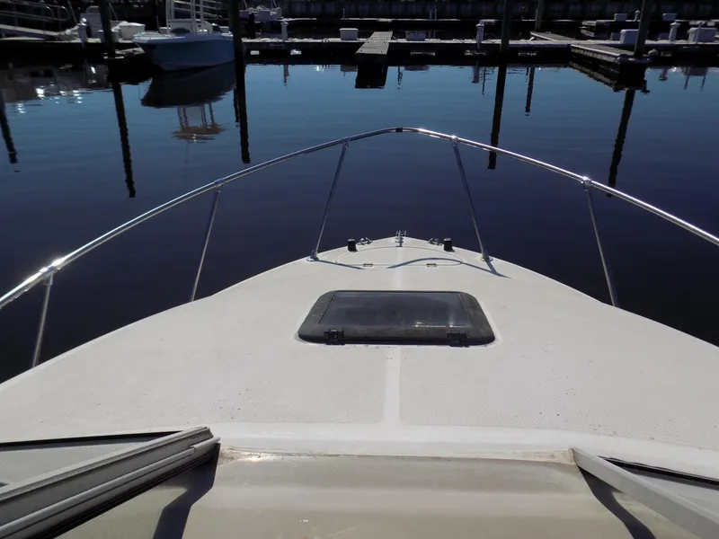 Slide: The Image of Bow view of 2001 Bayliner 2252 Ciera Classic at marina dock. - 7