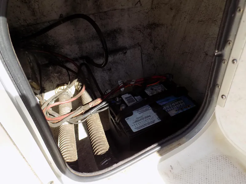 Slide: The Image of Battery compartment of 2001 Bayliner 2252 Ciera Classic boat with visible wiring. - 9