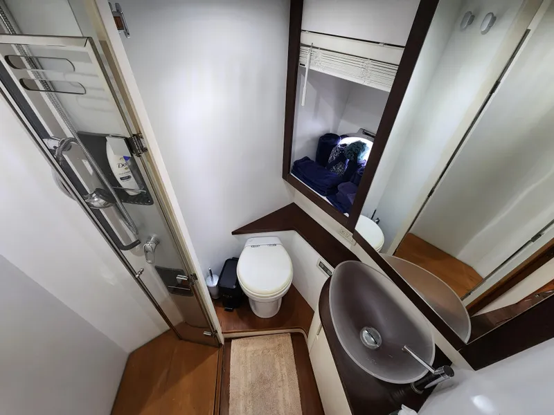 Slide: The Image of 2006 Pershing Cruiser bathroom with modern fixtures and shower. - 30