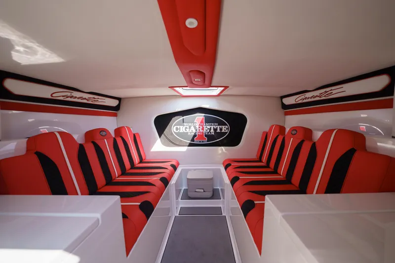 Slide: The Image of Interior of 2022 Cigarette 515 boat with red and black seating. - 3