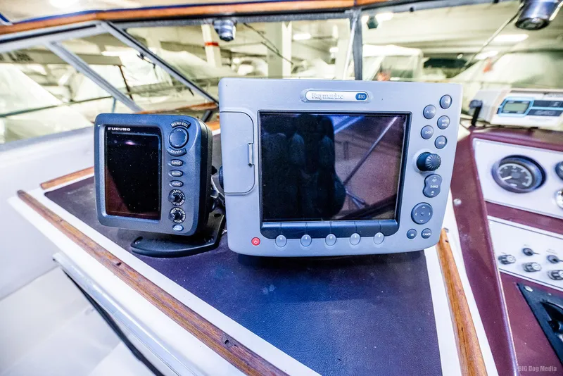 Slide: The Image of Navigation equipment on 1985 Chris-Craft 336 Mid Cabin boat dashboard. - 29