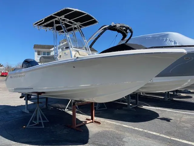 Slide: The Image of 2023 Key West 189 FS boat on display under clear blue sky. - 1