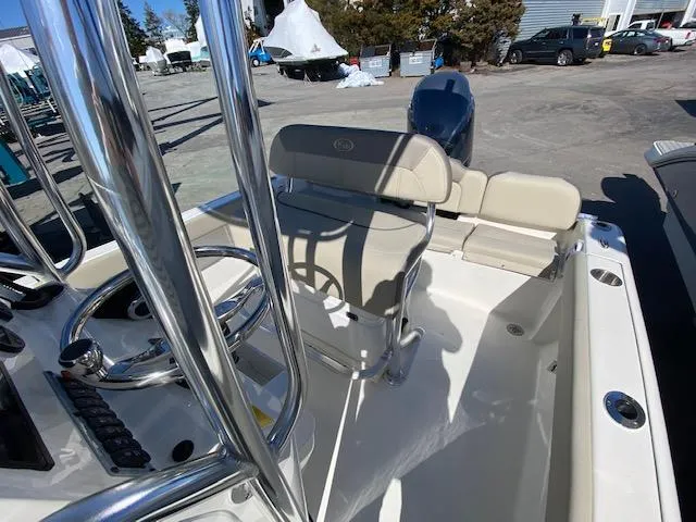 Slide: The Image of 2023 Key West 189 FS boat interior with steering wheel and seating. - 7