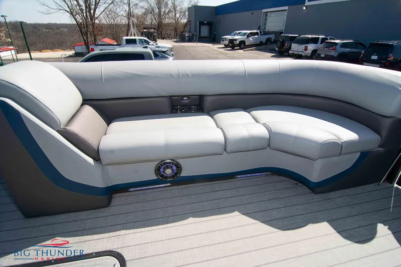 Slide: The Image of 2022 Manitou 25 OASIS RF SHP boat interior with luxurious seating. - 6
