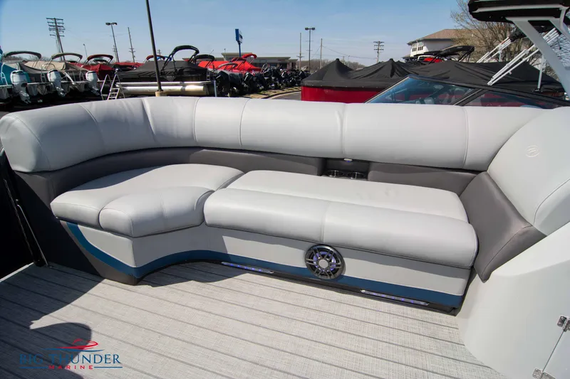 Slide: The Image of 2022 Manitou 25 OASIS RF SHP pontoon boat with luxurious seating. - 7