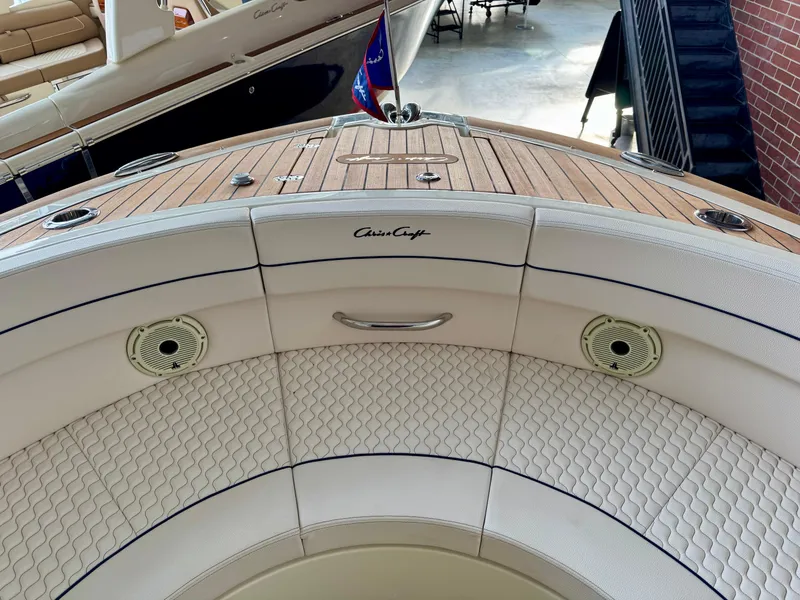 Slide: The Image of 2024 Chris-Craft Launch 35 GT boat interior with elegant seating and wood finish. - 47
