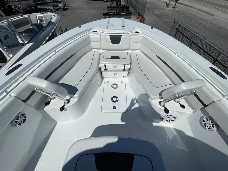 Slide: The Image of 2023 Wellcraft 352 Fisherman boat interior with seating and storage compartments. - 24