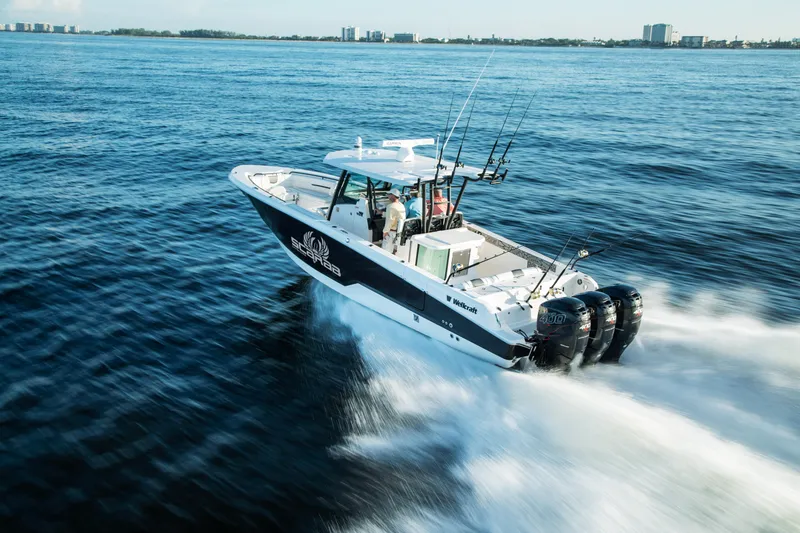 Slide: The Image of 2023 Wellcraft 352 Fisherman boat cruising on open water - 48