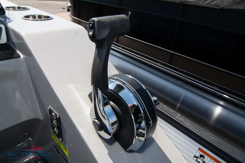 Slide: The Image of Throttle control of 2022 Manitou 23 Encore RF SHP boat. - 21