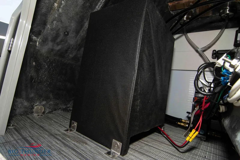 Slide: The Image of 2022 Manitou 23 Encore RF SHP interior wiring and components detail. - 37