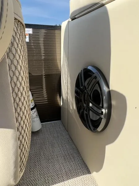 Slide: The Image of 2023 Crest Classic DLX 220 SLRC boat interior with speaker detail. - 11