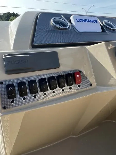 Slide: The Image of Control panel of 2023 Crest Classic DLX 220 SLRC CPT DLX boat with Lowrance system. - 13