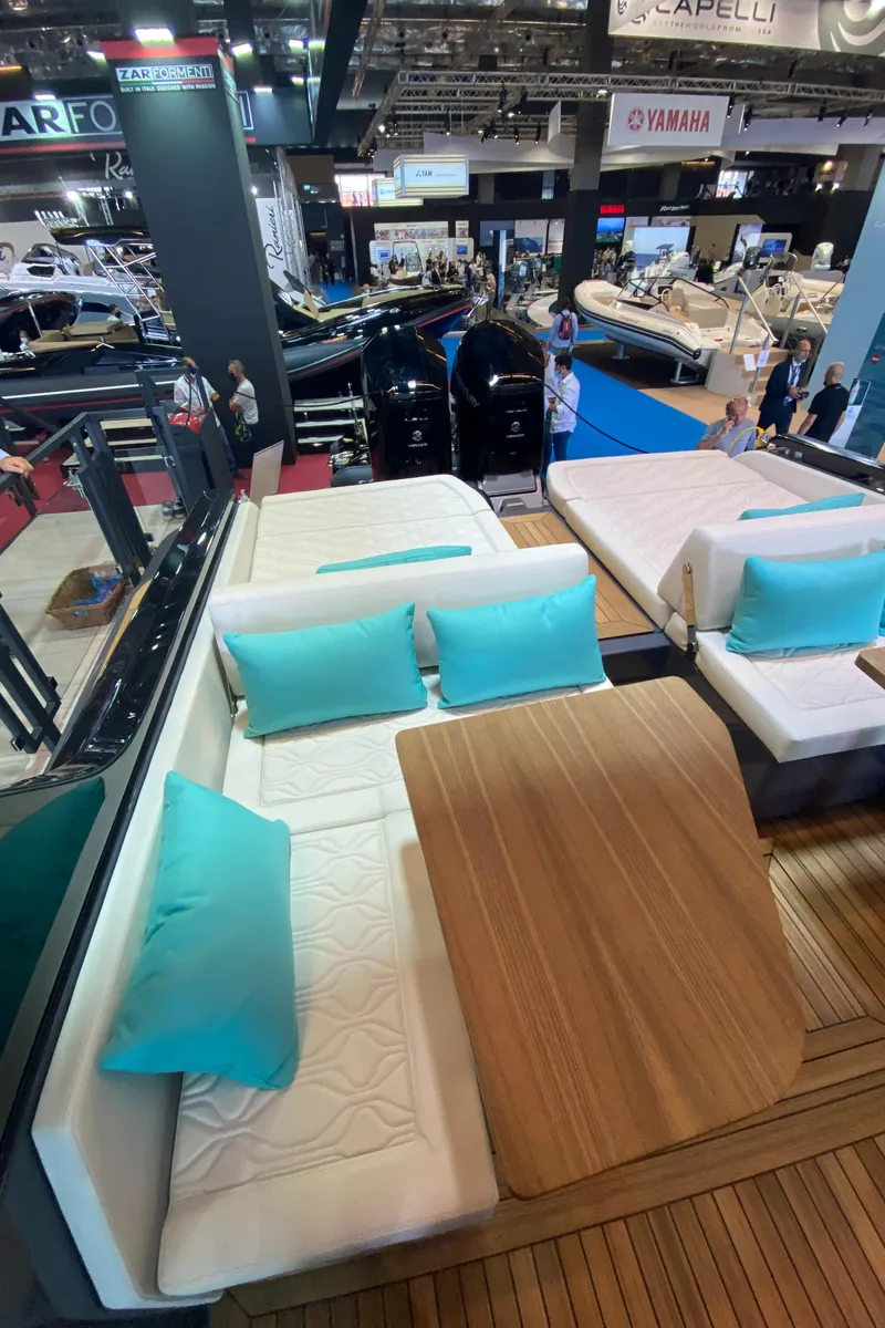 Slide: The Image of 2024 Zar Formenti Imagine 130 luxury boat interior at a boat show. - 21