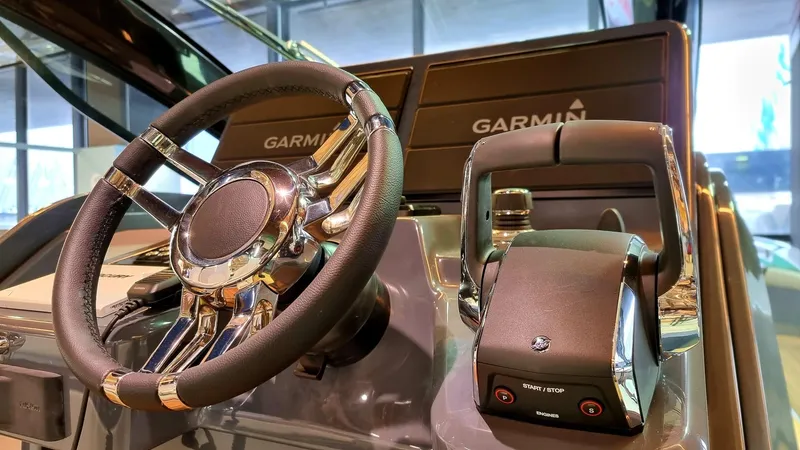 Slide: The Image of 2024 Zar Formenti Imagine 130 boat dashboard with Garmin navigation system. - 9