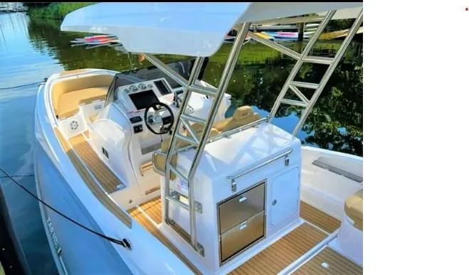 The Image of 2025 Zar Formenti 85 SL boat displayed at a marina with Mercury engine. - 0