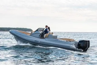 Slide: The Image of 2024 Zar Formenti 85sl boat cruising on open water. - 6