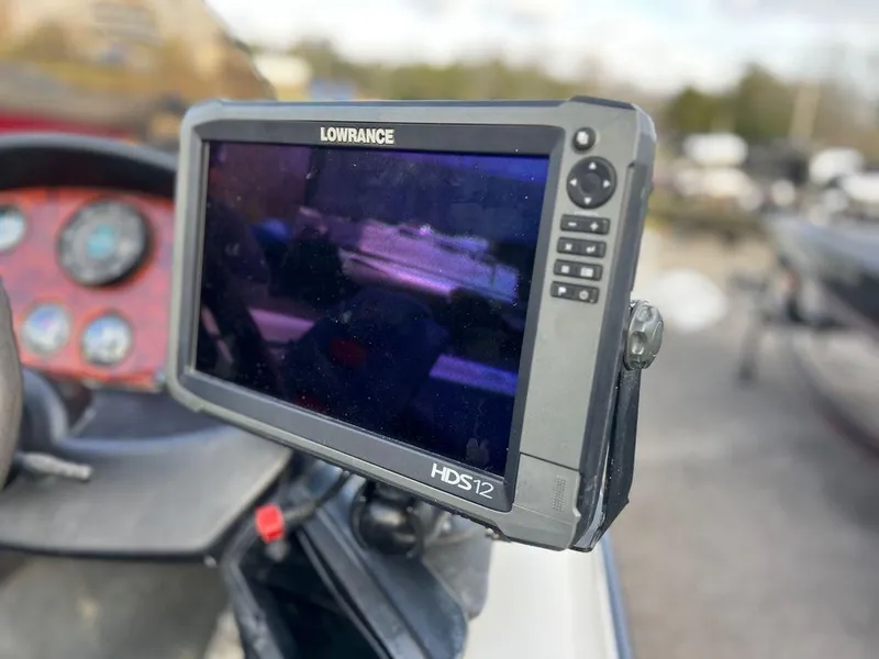 Slide: The Image of Lowrance HDS12 fishfinder on 1999 Triton TR20 boat dashboard. - 9