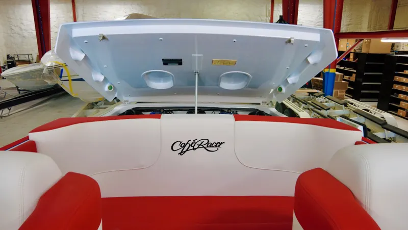 Slide: The Image of 2023 Cigarette 35 Cafe Racer boat interior with red and white seating. - 3