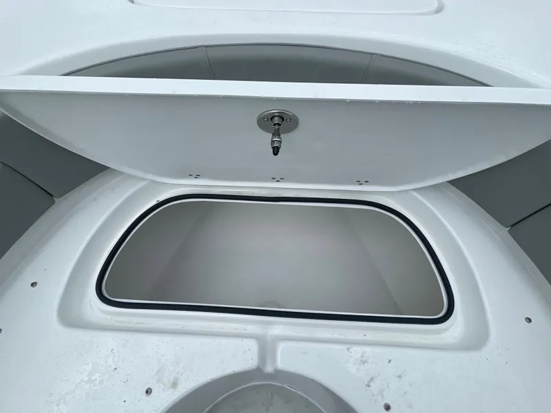 Slide: The Image of Open storage compartment on a 2026 Cape Horn 24XS boat. - 15