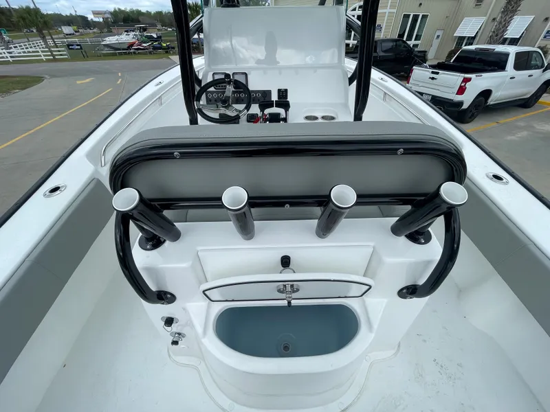 Slide: The Image of 2026 Cape Horn 24XS boat interior with rod holders and storage compartments. - 6