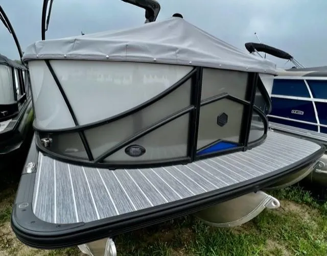 Slide: The Image of 2023 South Bay 525ARCH3.0 pontoon boat with covered deck and modern design. - 2