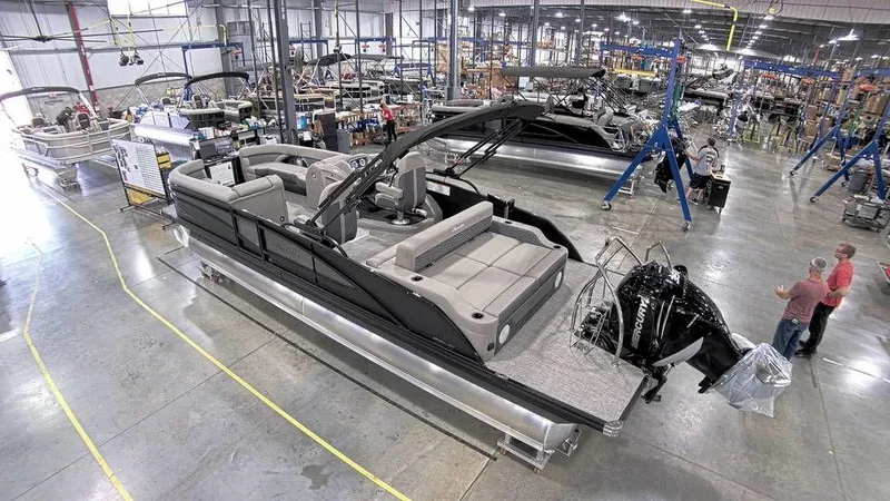 Slide: The Image of 2023 Barletta CORSA 25UC pontoon boat in a manufacturing facility. - 5