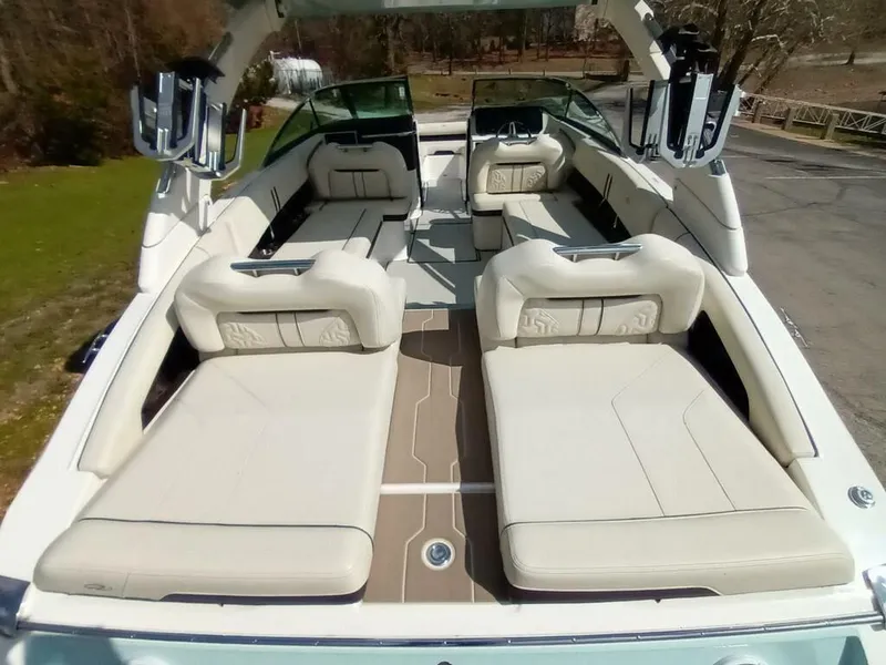 Slide: The Image of 2023 Regal LS9 Surf boat with luxurious seating and modern design. - 10