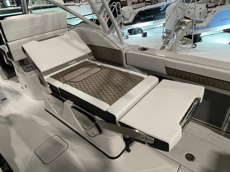 Slide: The Image of 2026 Blackfin 302 DC boat interior with adjustable seating and modern design. - 15