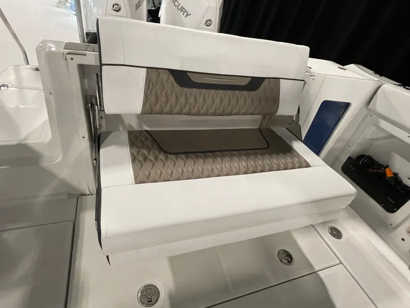 Slide: The Image of 2026 Blackfin 302 DC boat seat with diamond-patterned upholstery. - 20