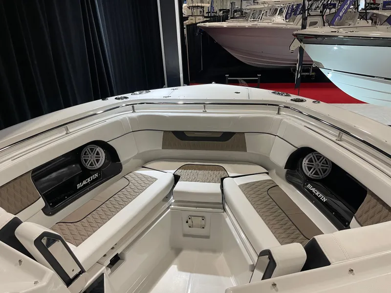 Slide: The Image of 2026 Blackfin 302 DC boat interior with luxurious seating and modern design. - 4