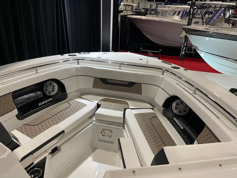Slide: The Image of 2026 Blackfin 302 DC boat interior with luxurious seating and modern design. - 6