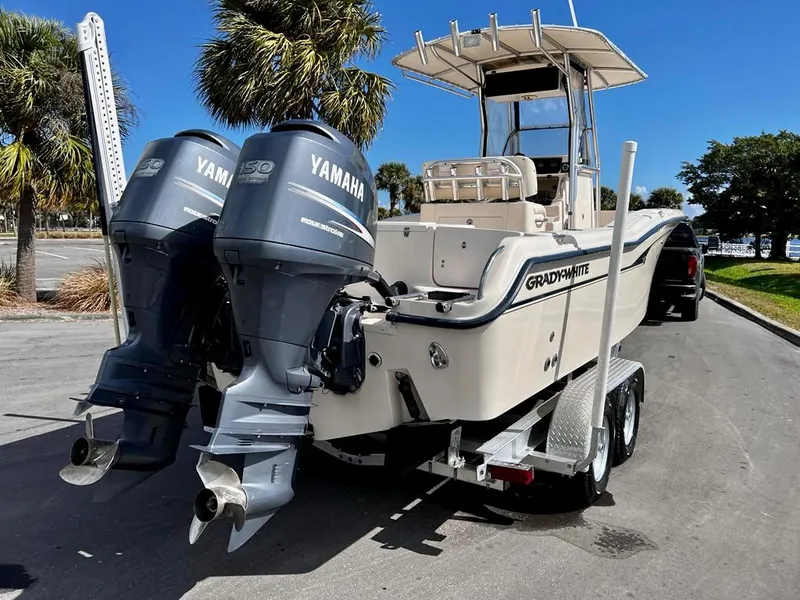 Slide: The Image of 2005 Grady-White 257 Advance boat with twin Yamaha engines on a trailer. - 13