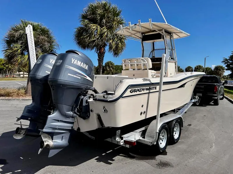 Slide: The Image of 2005 Grady-White 257 Advance boat with twin Yamaha engines on trailer. - 22