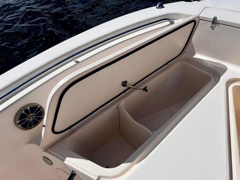 Slide: The Image of Open storage compartment on 2005 Grady-White 257 Advance boat. - 29