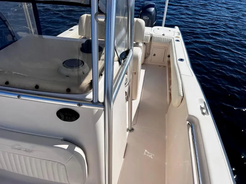 Slide: The Image of 2005 Grady-White 257 Advance boat interior, featuring sleek design and spacious deck. - 39