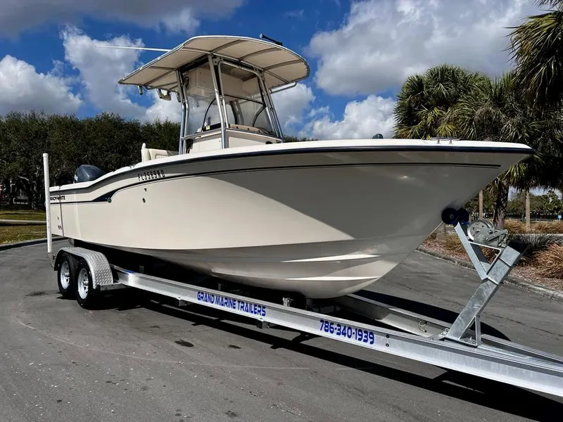 Slide: The Image of 2005 Grady-White 257 Advance boat on trailer under blue sky. - 6
