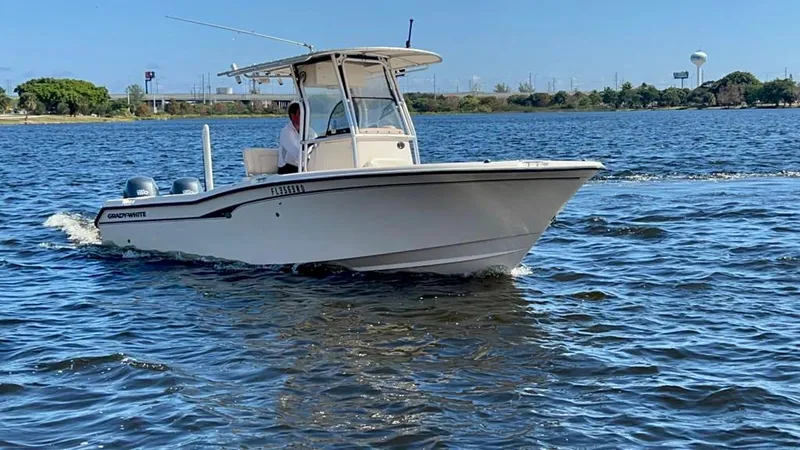 Slide: The Image of 2005 Grady-White 257 Advance boat cruising on a sunny day. - 7