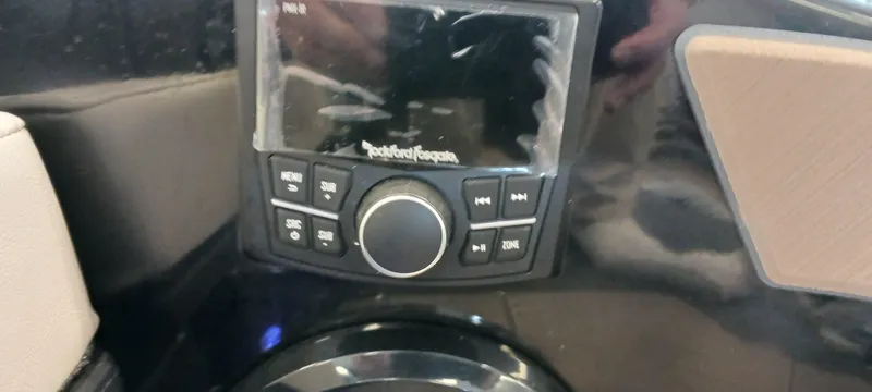 Slide: The Image of 2023 Heyday H22 boat dashboard with Rockford Fosgate audio system. - 12