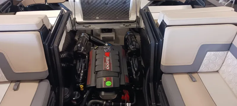 Slide: The Image of 2023 Heyday H22 boat engine compartment with seating, showcasing powerful engine design. - 13