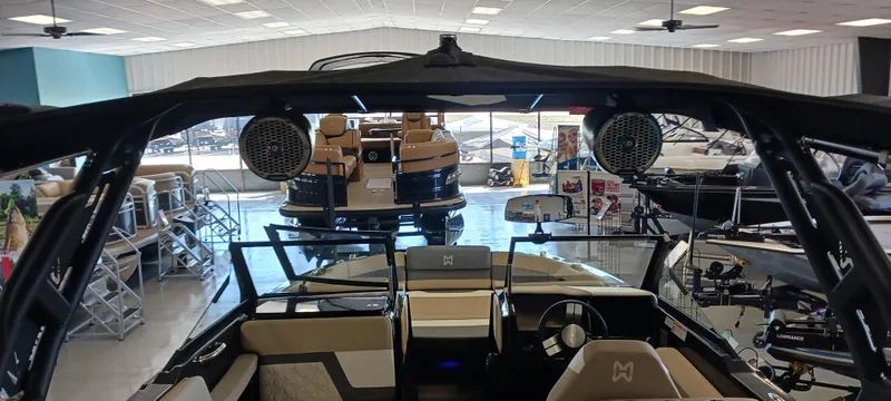 Slide: The Image of 2023 Heyday H22 boat interior in showroom, featuring modern design and audio speakers. - 14