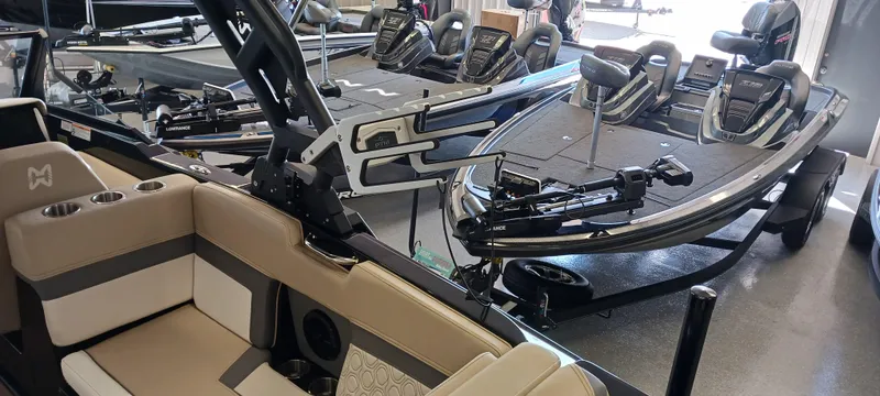 Slide: The Image of 2023 Heyday H22 boat interior with fishing equipment in showroom. - 16