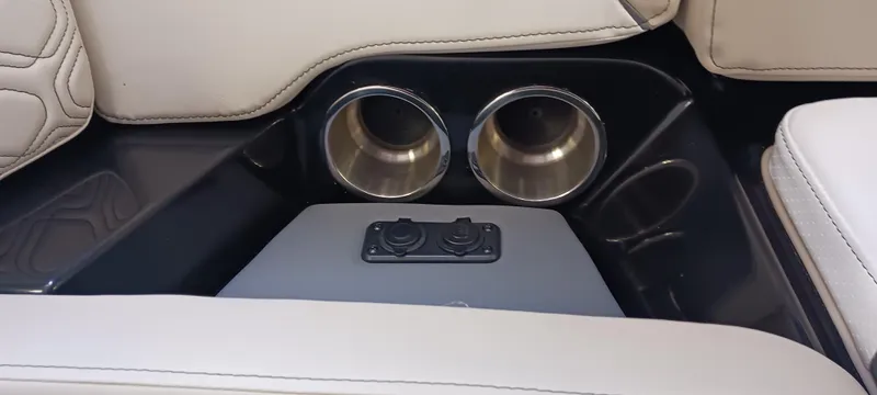 Slide: The Image of 2023 Heyday H22 boat interior with cup holders and USB ports. - 20