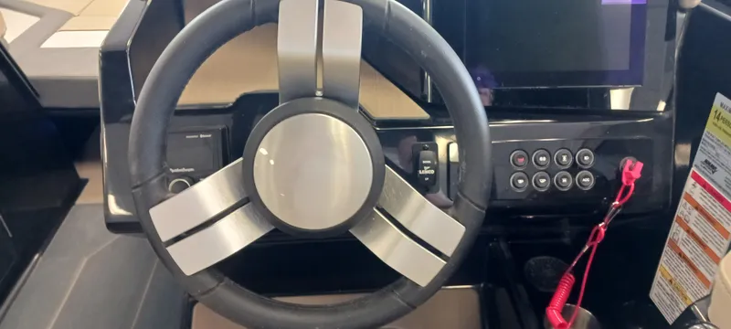Slide: The Image of 2023 Heyday H22 boat dashboard with steering wheel and control panel. - 21
