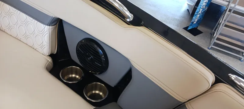 Slide: The Image of 2023 Heyday H22 boat interior with speaker and cup holders. - 32