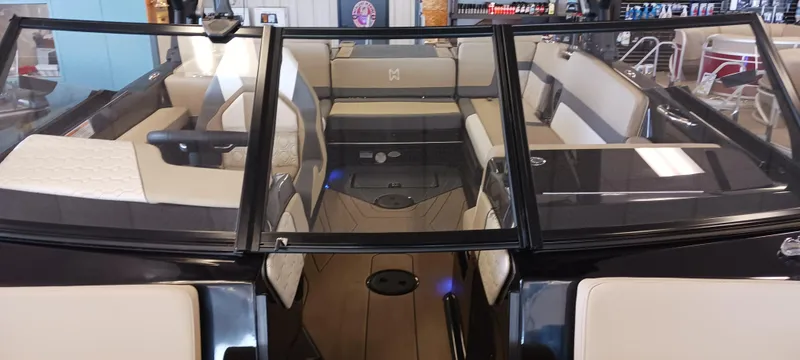 Slide: The Image of 2023 Heyday H22 boat interior with beige seating and sleek design. - 33