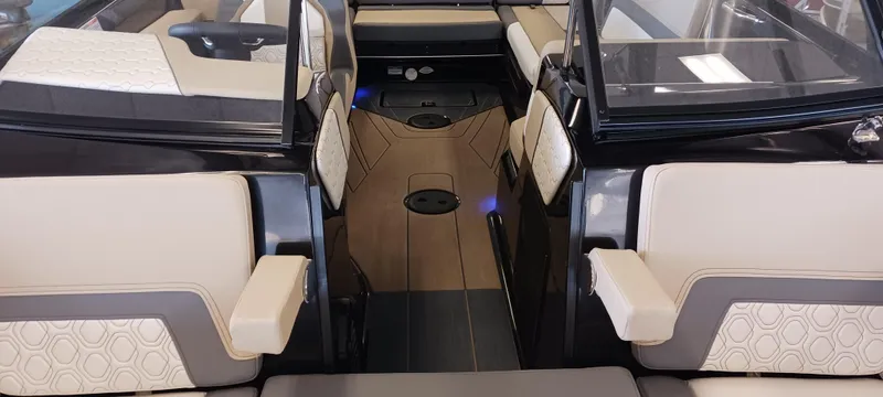 Slide: The Image of 2023 Heyday H22 boat interior with beige and black seating, modern design. - 36