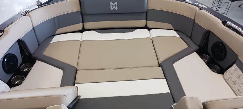 Slide: The Image of 2023 Heyday H22 boat interior with beige and gray seating. - 39