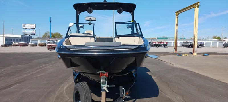 Slide: The Image of 2023 Heyday H22 boat on trailer, parked outdoors under clear blue sky. - 4